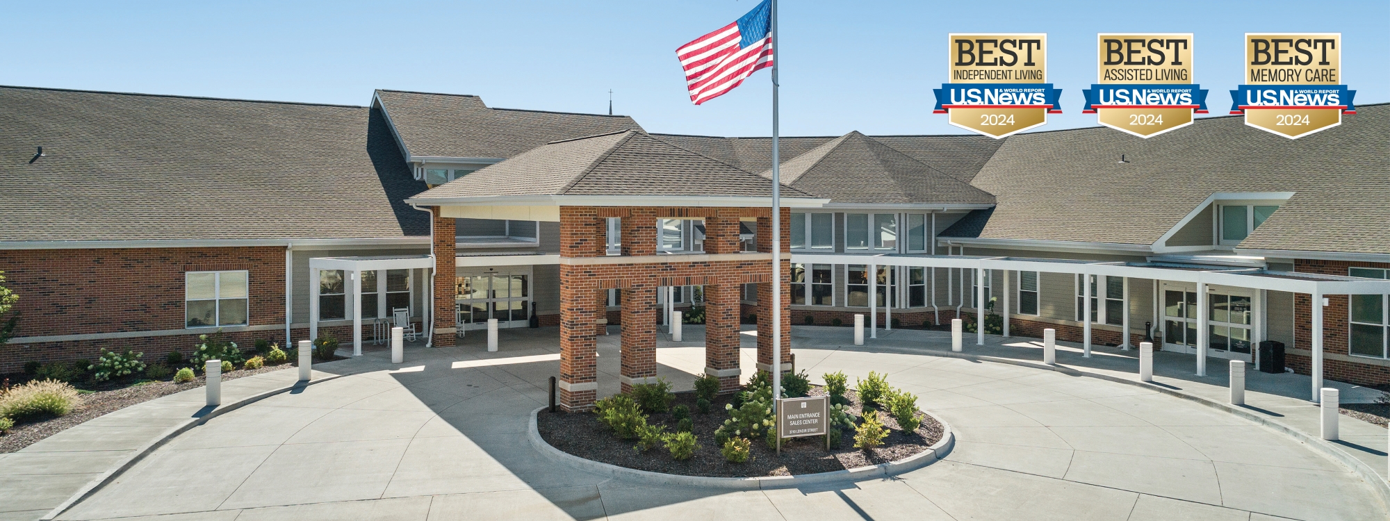 Entry of Lenoir Woods assisted living in Columbia, MO, awarded Best Independent Living, Memory Care, and Continuing Care Retirement Community by US News.