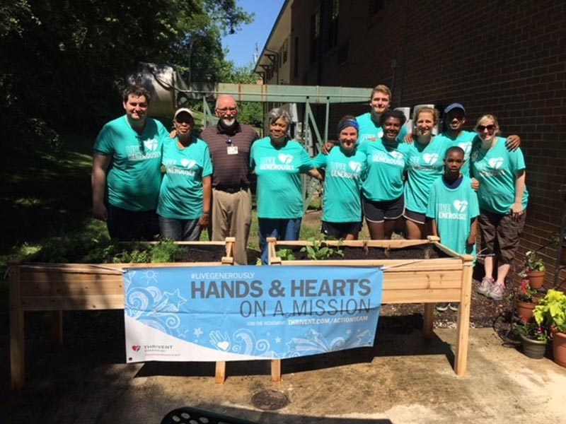 Vista and Thrivent team up to build a raised garden at our Dunn Road Manor campus.